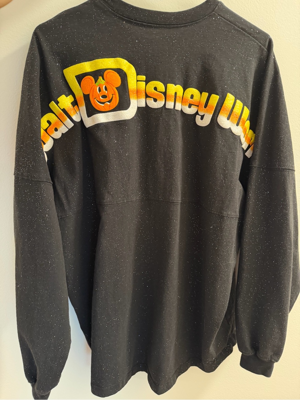Disney Black Speckled Crewneck with Yellow & Orange Retro Logo